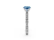 Fancy Blue Round Cut Diamond Solitaire Ring Set in White gold with Slim Pavé Band and Prong Setting