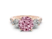 Fancy Pink Three-Stone Round Cut Diamond Pavé Band Ring Set in Rose gold with Prong-Set Trio