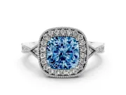 Fancy Blue Cushion Cut Diamond Halo Engagement Ring Set in Platinum with Milgrain Pavé Band