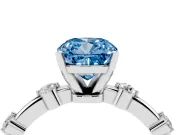 Fancy Blue Cushion Cut Diamond Solitaire Ring Set in Platinum with Bezel Set Side Stones and Prong Setting