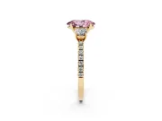 Fancy Pink Oval Cut Diamond Three-Stone Ring Set in Yellow gold with Pavé Band and Graduated Sides