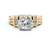 Three-Stone Cushion Cut Diamond Channel Set Ring Set in Yellow gold with Bar Prongs