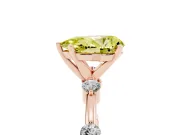 Fancy Yellow Pear Cut Diamond Solitaire Ring Set in Rose gold with Bezel Set Side Stones and Prong Setting