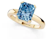 Fancy Blue Radiant Cut Diamond Solitaire Ring Set in Yellow gold with Prong Head and Smooth Polished Band