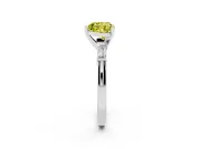 Fancy Yellow Heart Cut Diamond Solitaire Ring Set in Silver with Tapered Baguette Side Stones and Prong Setting