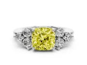 Fancy Yellow Cushion Cut Diamond Solitaire Ring Set in Silver with Cluster Accents on Each Side