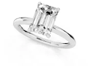 Emerald Cut Diamond Solitaire Ring Set in Platinum with Thin Band and Prong Setting