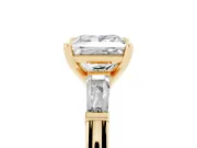Princess Cut Diamond Solitaire Ring Set in Yellow gold with Tapered Baguette Side Stones and Prong Setting