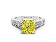 Fancy Yellow Cushion Cut Diamond Solitaire Pavé Engagement Ring Set in White gold with Prong Setting