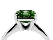 Fancy Green Asscher Cut Diamond Solitaire Ring Set in Platinum with Prong Setting on a Plain Round Band