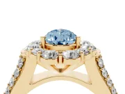 Fancy Blue Pear Cut Diamond Halo Engagement Ring Set in Yellow gold with Split Shank and Prong Setting