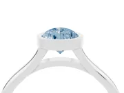 Fancy Blue Bezel Set Pear Cut Diamond Solitaire Ring Set in White gold with Tapered Band