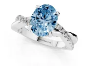Fancy Blue Oval Cut Diamond Twist Band Solitaire Set in Platinum with Pavé Accents and Prong Setting
