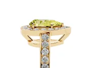 Fancy Yellow Pear Cut Diamond Halo Pavé Engagement Ring Set in Yellow gold with Bezel Setting