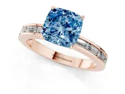 Fancy Blue Cushion Cut Diamond Solitaire Ring Set in Rose gold with Channel-Set Baguette Band and Prong Setting