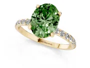 Fancy Green Oval Cut Diamond Solitaire Ring Set in Yellow gold with Round Pavé Band and Prong Setting
