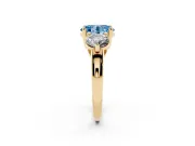 Fancy Blue Oval Cut Diamond Three-Stone Ring Set in Yellow gold with Prong Setting and Classic Band
