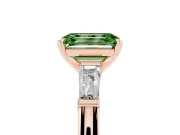 Fancy Green Emerald Cut Diamond Solitaire Ring Set in Rose gold with Tapered Baguette Side Stones and Prong Setting