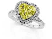 Fancy Yellow Heart Cut Diamond Halo Pavé Solitaire Ring Set in White gold with Prong-Set Center Stone