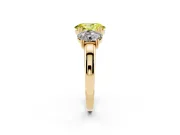 Fancy Yellow Oval Cut Diamond Three-Stone Ring Set in Yellow gold with Polished Band and Prong Setting