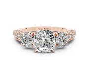 Cushion Cut Diamond Three-Stone Ring Set in Rose gold with Round Side Stones and Pavé Band