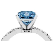 Fancy Blue Princess Cut Diamond Solitaire Ring Set in Platinum with Twisted Band and Bead Prong Setting