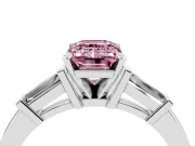Fancy Pink Emerald Cut Diamond Solitaire Ring Set in Platinum with Tapered Baguette Accents and Prong Setting