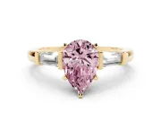 Fancy Pink Pear Cut Diamond Solitaire Ring Set in Yellow gold with Tapered Baguette Accents and Prong Setting