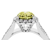 Fancy Yellow Oval Cut Diamond Halo Ring Set in Silver with Pavé Band and Raised Center Setting