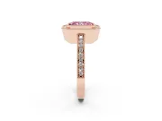 Fancy Pink Radiant Cut Diamond Halo Engagement Ring Set in Rose gold with Pavé Band and Round Halo Stones