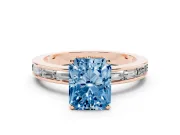 Fancy Blue Radiant Cut Diamond Solitaire Ring Set in Rose gold with Channel-Set Baguette Band and Prong Setting