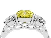 Fancy Yellow Cushion Cut Diamond Three-Stone Ring Set in White gold with Pavé Band
