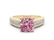 Fancy Pink Cushion Cut Diamond Solitaire Ring Set in Yellow gold with Channel-Set Band and Prong Setting