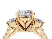 Three-Stone Round Cut Diamond Pavé Band Ring Set in Yellow gold with Prong-Set Trio