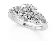 Round Cut Diamond Three-Stone Ring Set in Silver with Pear Side Stones