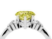 Fancy Yellow Three-Stone Heart Cut Diamond Channel Set Ring Set in Platinum with Bar Prongs
