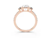 Oval Cut Diamond Three-Stone Ring Set in Rose gold with Pavé Band and Graduated Sides