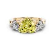 Fancy Yellow Heart Cut Diamond Three-Stone Ring Set in Yellow gold with Bold Center and Classic Band