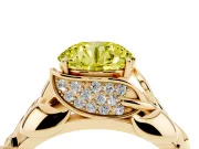 Fancy Yellow Round Cut Diamond Leaf-Inspired Engagement Ring Set in Yellow gold with Round Accents