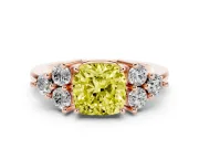 Fancy Yellow Cushion Cut Diamond Solitaire Ring Set in Rose gold with Cluster Accents on Each Side