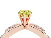 Fancy Yellow Pear Cut Diamond Solitaire Ring Set in Rose gold with Side Stones on Criss-Cross Band and Prong Setting