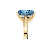 Fancy Blue Radiant Cut Diamond Solitaire Ring Set in Yellow gold with Prong Setting and Classic Band