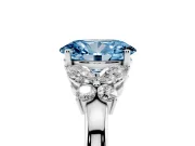 Fancy Blue Oval Cut Diamond Solitaire Floral Ring Set in White gold with Marquise Petals and Prong Setting