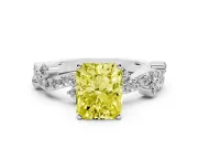 Fancy Yellow Radiant Cut Diamond Solitaire Twisted Band Set in White gold with Pavé Setting