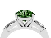 Fancy Green Round Cut Diamond Solitaire Ring Set in Silver with Tapered Baguette Side Stones and Prong Setting