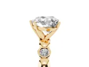 Heart Cut Diamond Solitaire Ring Set in Yellow gold with Bezel-Set Accents on Beaded Band and Prong Setting