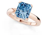 Fancy Blue Radiant Cut Diamond Solitaire Ring Set in Rose gold with Prong Head and Smooth Polished Band