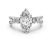 Marquise Cut Diamond Three-Stone Ring Set in White gold with Pavé Split Shank and Prong Setting