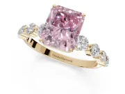 Radiant Cut Graduated Side Stone Engagement Ring Setting for a Fancy Pink Lab-Grown Diamond | Yellow Gold