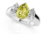 Fancy Yellow Three-Stone Pear Cut Diamond Ring Set in White gold with Matching Prong Settings and Plain Band